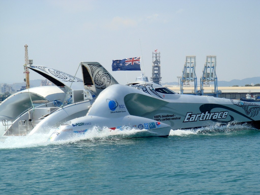 Earthrace flies the NZL flag - Sagunto Spain - after breaking Round the World Record © Earthrace Media http://www.earthrace.net